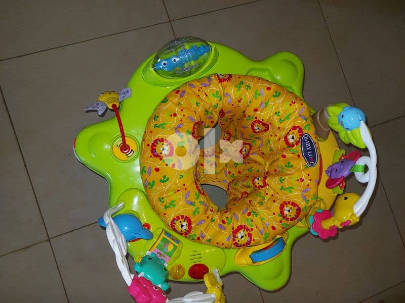 marche bébé and exersaucer 7