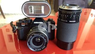 vintage Miranda camera, made in Japan with two lenses and a flash