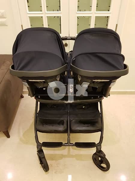 peg perego twin stroller and car seats 1