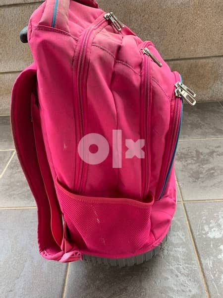 pink backpack with wheels for school 6