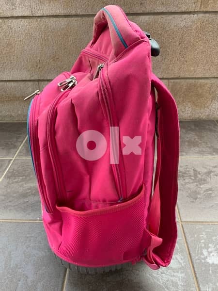 pink backpack with wheels for school 7