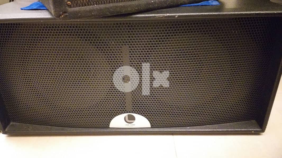 ( 2 ) speakers double 12 inch like new . logic audio. like new 0