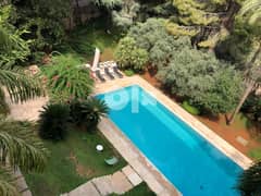 Double level villa with swimming pool and garden in high end street 0