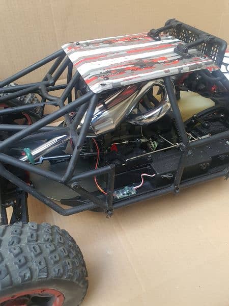 LOSI DBXL with 36cc, tuned muffler almost new with spectrum radio 1