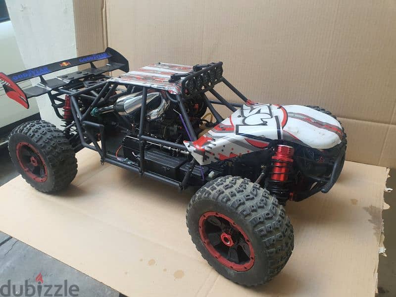 LOSI DBXL with 36cc, tuned muffler almost new with spectrum radio 2
