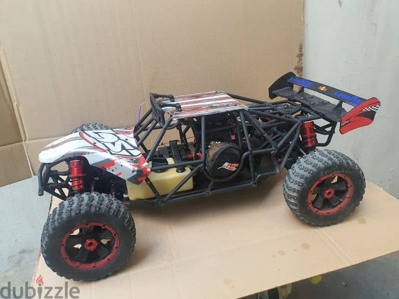 LOSI DBXL with 36cc, tuned muffler almost new with spectrum radio 3