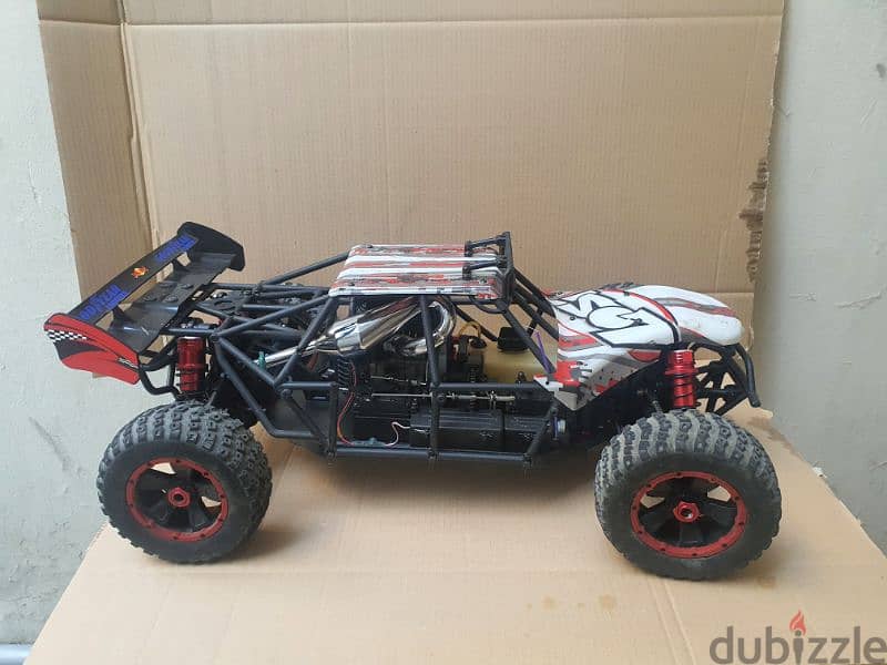 LOSI DBXL with 36cc, tuned muffler almost new with spectrum radio 4