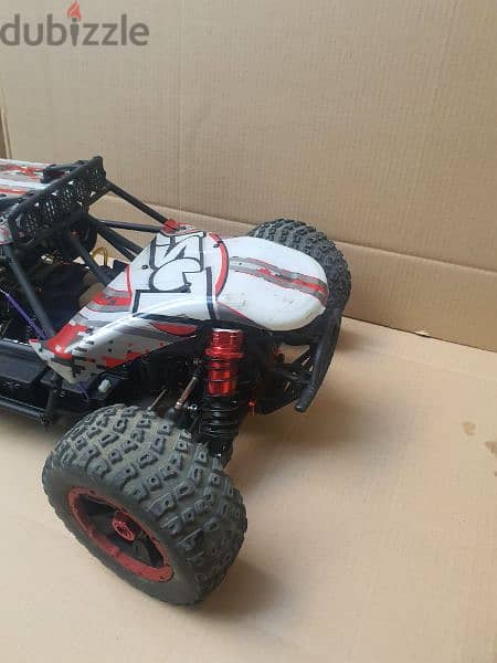 LOSI DBXL with 36cc, tuned muffler almost new with spectrum radio 5