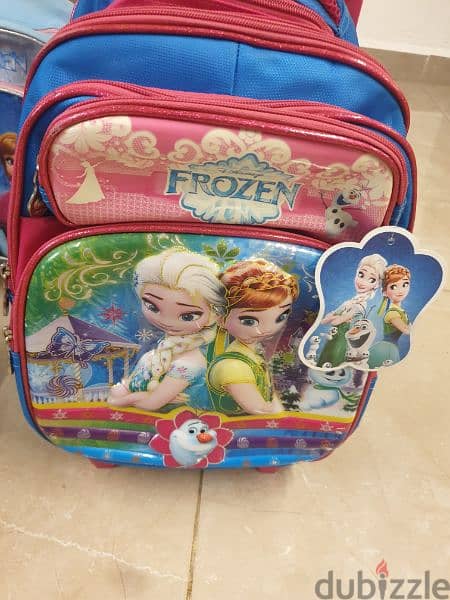 frozen school bag with wheels roller school bag exellent quality شنطة 2