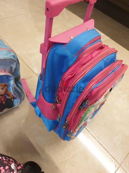 frozen school bag with wheels roller school bag exellent quality شنطة 5