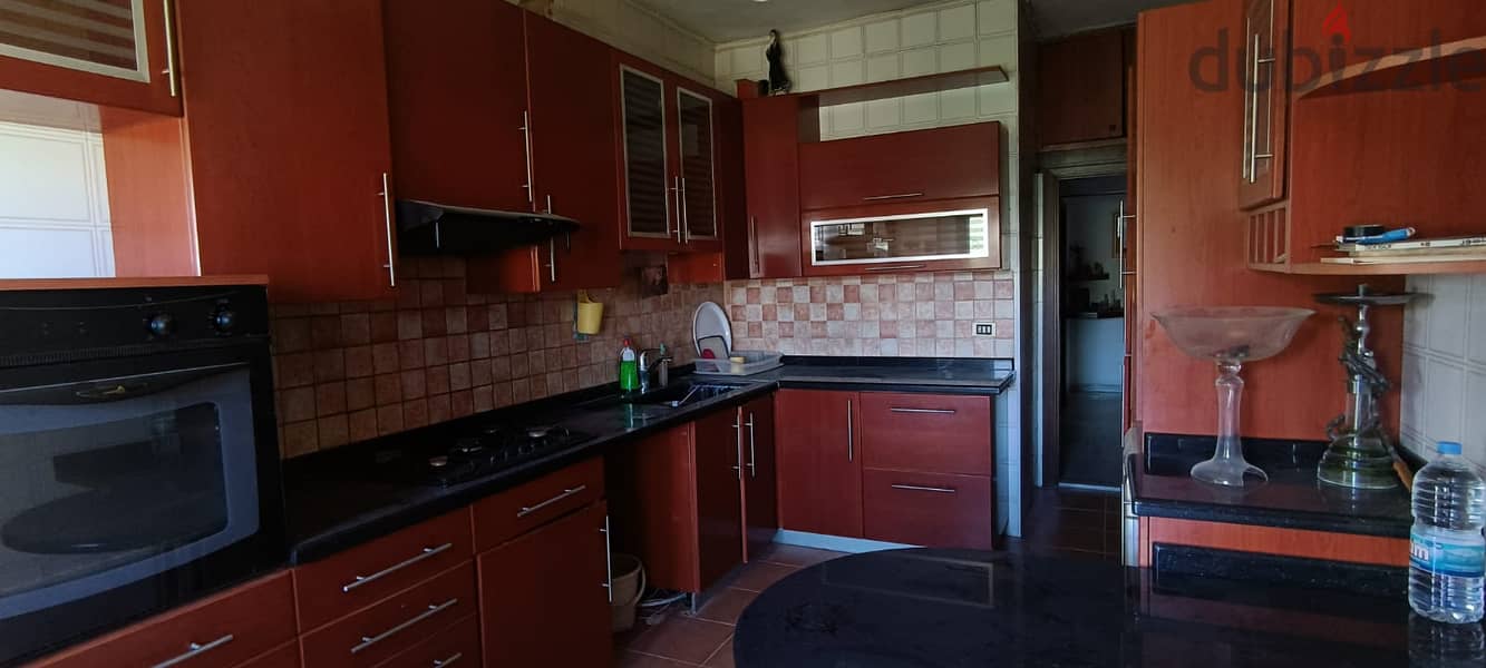 RWK129JS - Apartment For Sale in Ballouneh شقة للبيع في بلونة 5