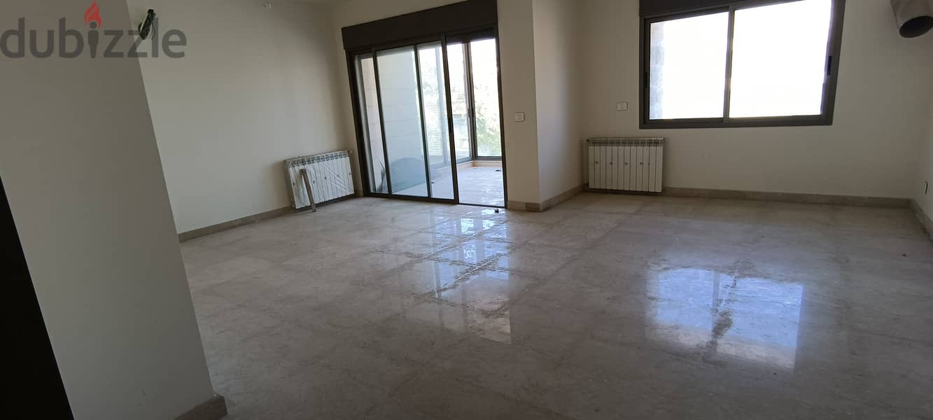 RWK138JS - Apartment For Sale in Ballouneh - شقة للبيع في بلونة 2