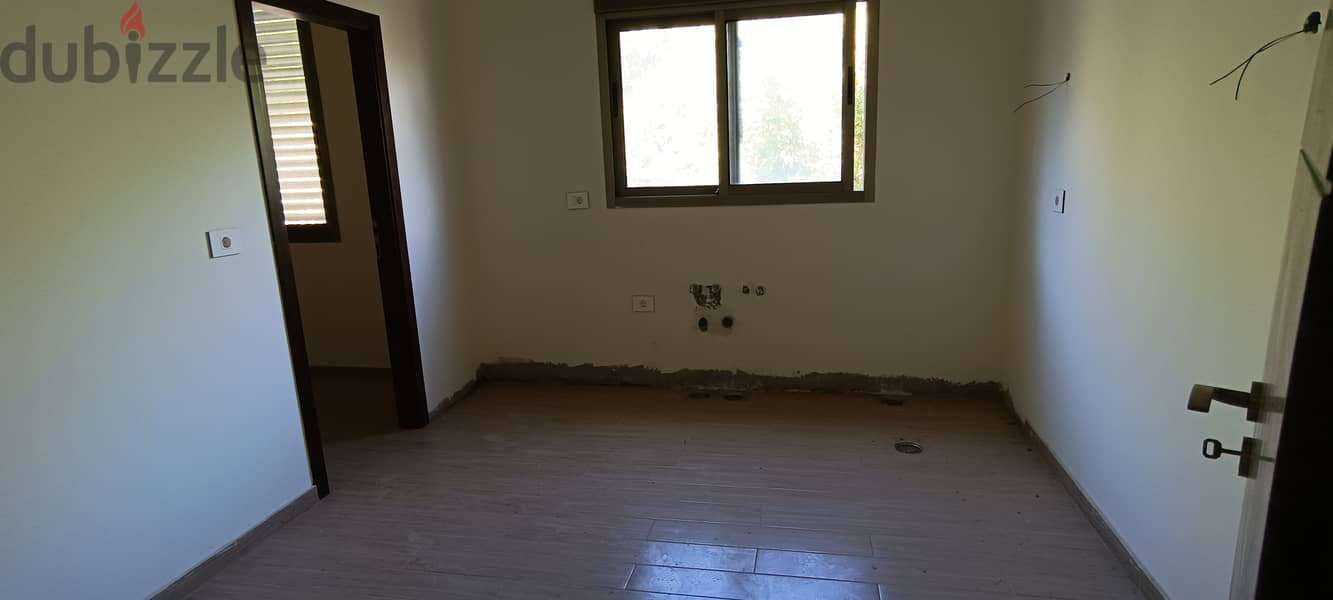 RWK138JS - Apartment For Sale in Ballouneh - شقة للبيع في بلونة 3