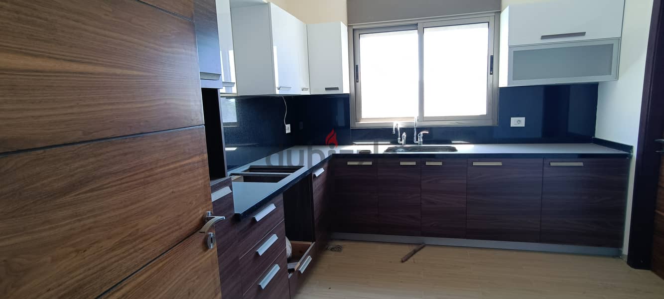 RWK138JS - Apartment For Sale in Ballouneh - شقة للبيع في بلونة 9