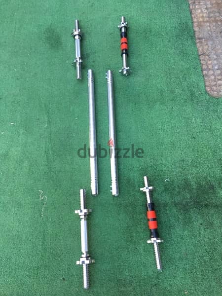 dumbells axes adjustable with adjustable new very good quality 1