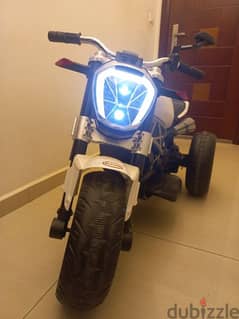 Kids Ride on a 3 wheel Electric Motorbike with LED Light and music 0