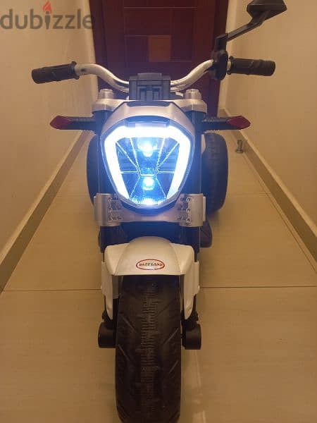 Kids Ride on a 3 wheel Electric Motorbike with LED Light and music 2
