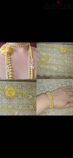 necklace long yellow colour with flower brooch and bracelet