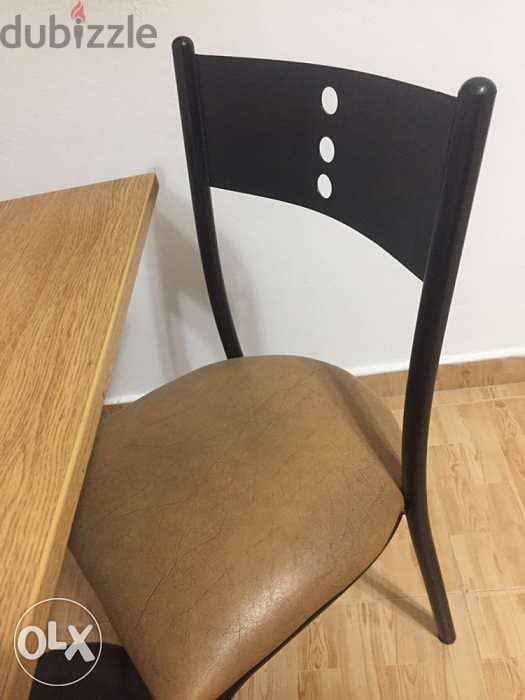 Table and 2 chairs. wood and metal. طاولة وكراسي 2