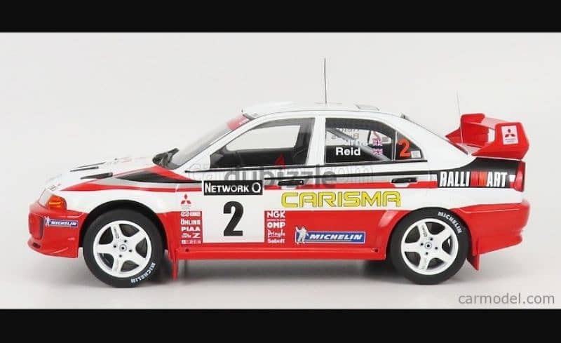 Mitsubishi Lancer RS Evo V diecast car model 1:18. 1