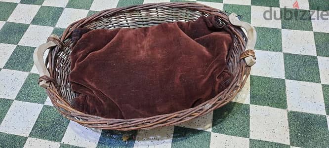 Basket with couch. could be Pet bed