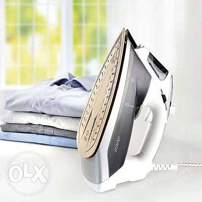 Quigg steam iron / 2$ delivery 3