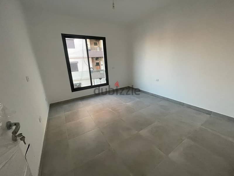 132 Sqm | Brand New Apartment for sale in Mar Roukoz | Sea + City view 8