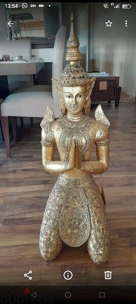 wood boudha sculpture