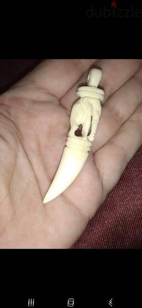 tooth pendant elephant figures