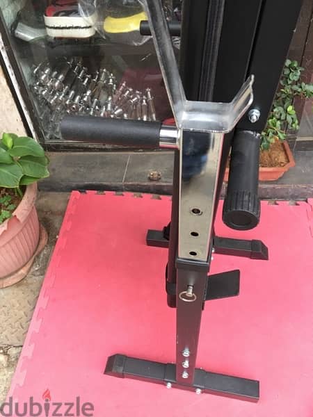 bench adjustable with adjustable rack with axe and weights all new 7