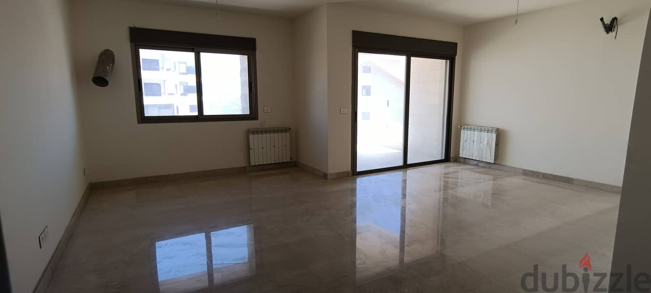 RWK215JS - Apartment For Sale in Ballouneh -  شقة للبيع في بلونة 1