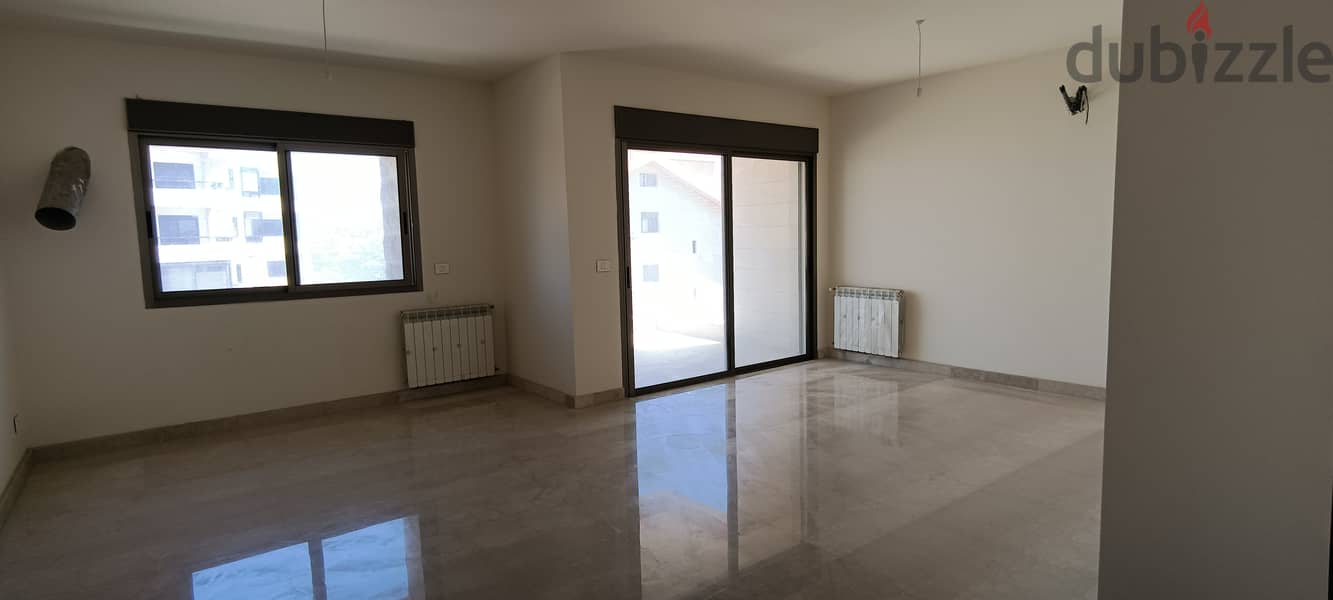 RWK215JS - Apartment For Sale in Ballouneh -  شقة للبيع في بلونة 3