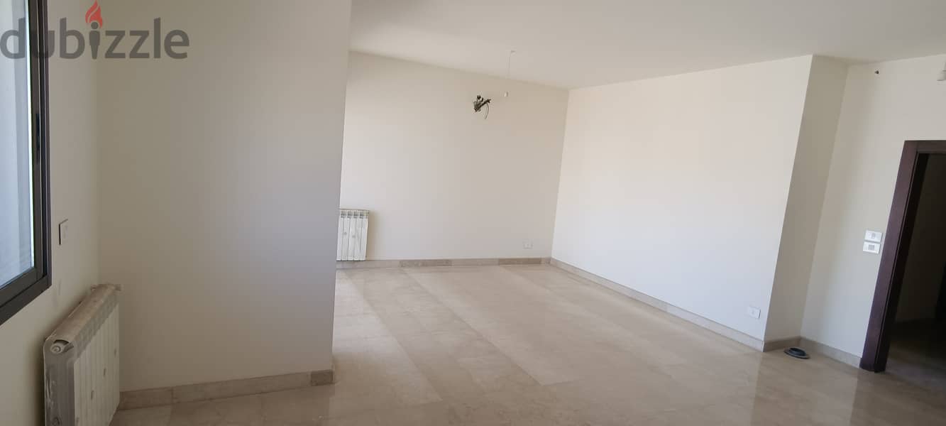 RWK215JS - Apartment For Sale in Ballouneh -  شقة للبيع في بلونة 4