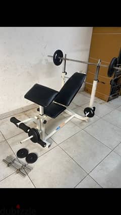 bench adjustable with adjustable rack with legs extension like new 0