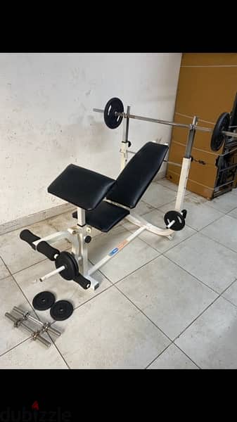 bench adjustable with adjustable rack with legs extension like new