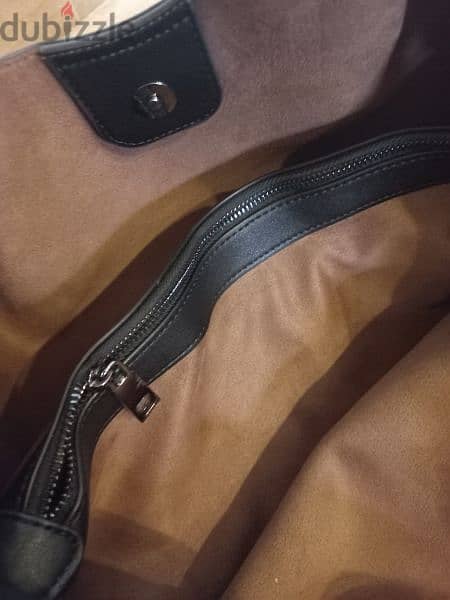 Leather handbag . New collectionجزدان جلد جديد 1