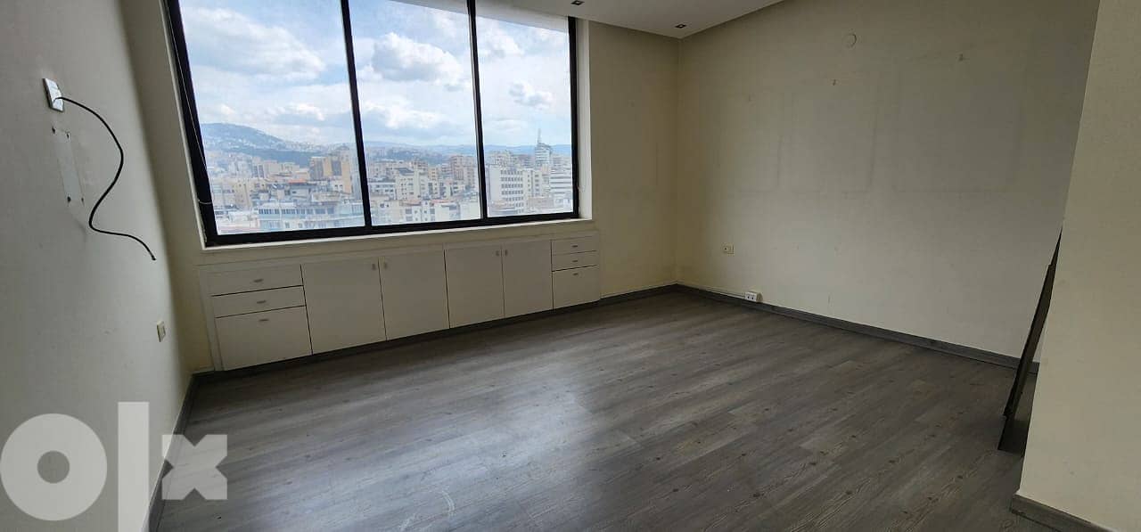L10889-A Spacious Office for Sale with great open view in Sin El Fil 2