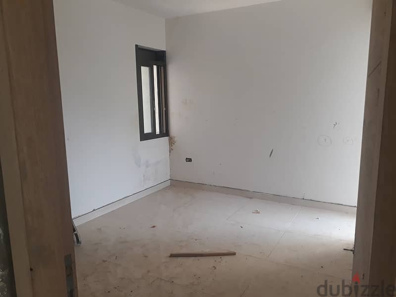 RWK234EM - Apartment For Sale In Zouk Mikael with installments 2