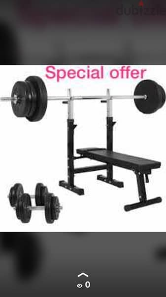 bench adjustable with big axe and 2 axe dumbells and 75 kg all new