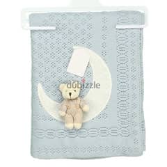 Baby blanket with soft toy