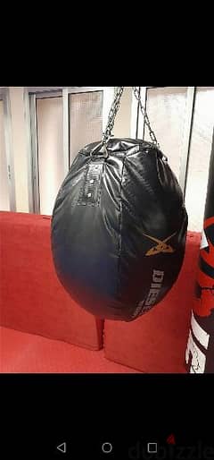 like new black circular diesel boxing bag for boxing 81701084
