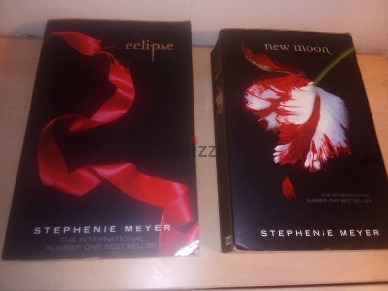 two books from the twilight saga"new moon" & eclipse by stephenie meye 0