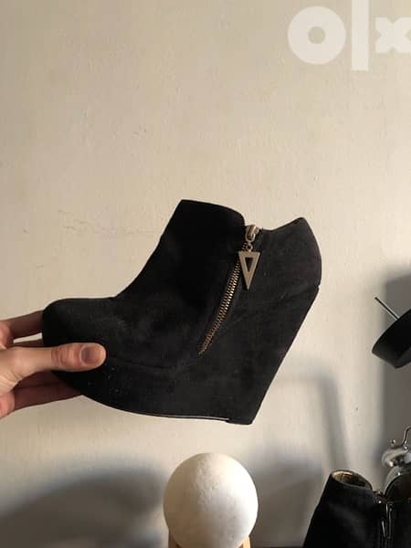 two heels , one new one used 0