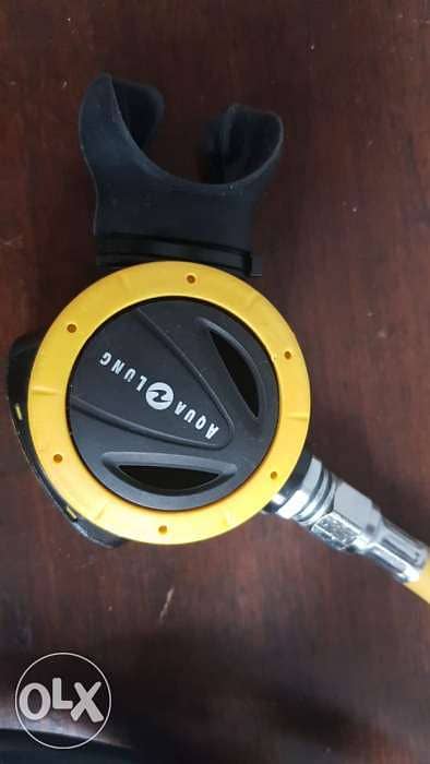 Aqualung regulator with Suunto Spg depth gauge and compass 5