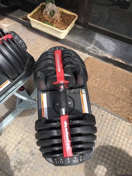 bowflex original like new with stand we have also all sports equipment 4