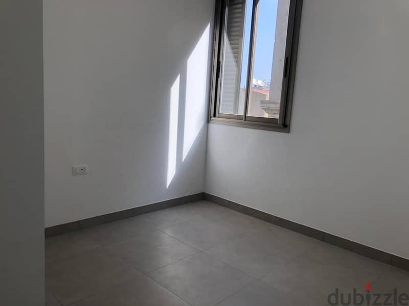 L11371- Modern 3-Bedroom Apartment for Rent in Gemmayze 1