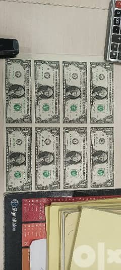 uncut sheet of 8 uncirculated dollar bills