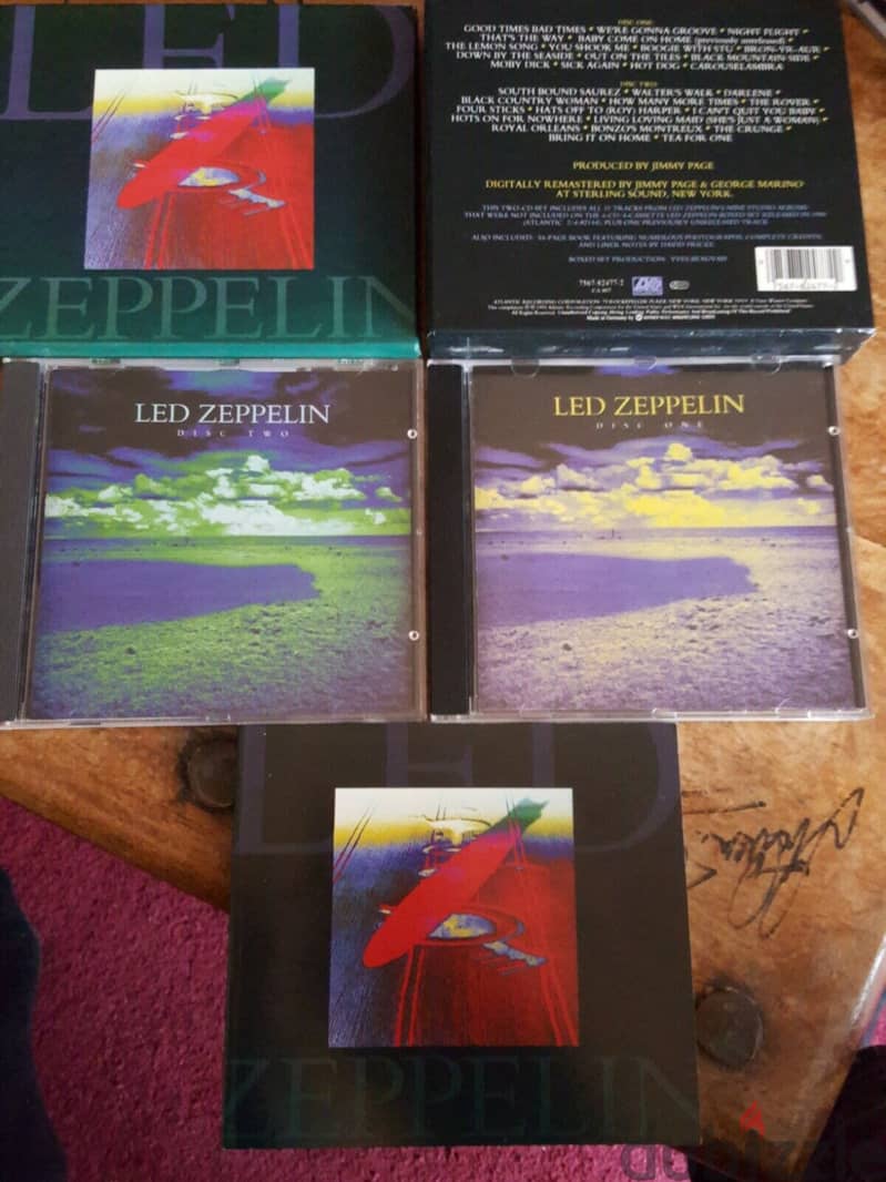Led Zeppelin boxed set 2 new open box 2 cds+book - Movies & Music