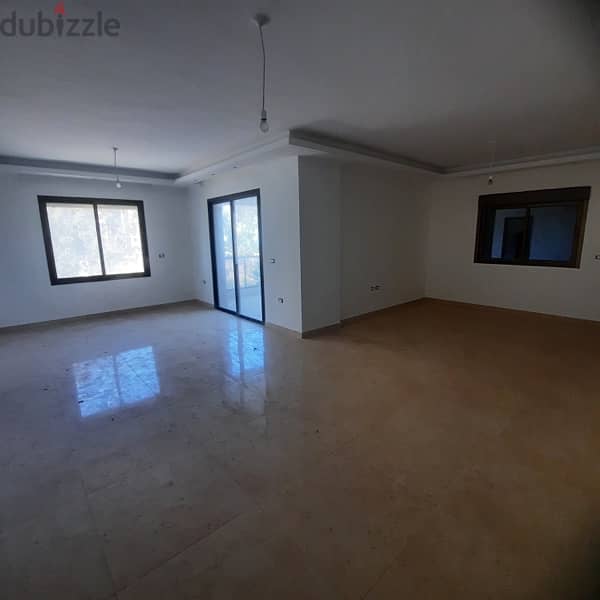 apartment for sale in dawhet el hoss  شقة للبيع في دوحة الحص مع حديقة 1