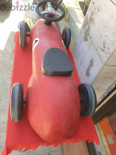 antique car formula 1 made from iron